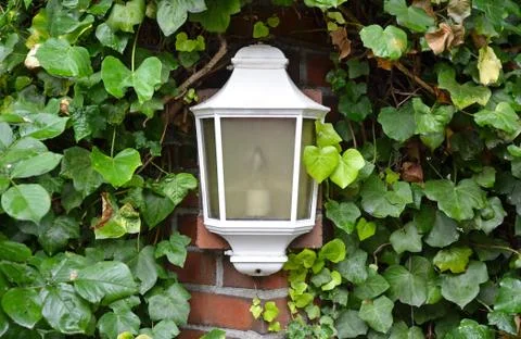 White lamp on brick wall Stock Photos
