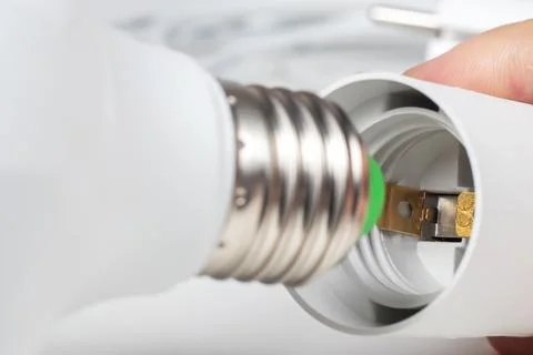 White lamp socket and lamp bulb, Electric cartridge for light bulbs, lamp h.. Foto stock