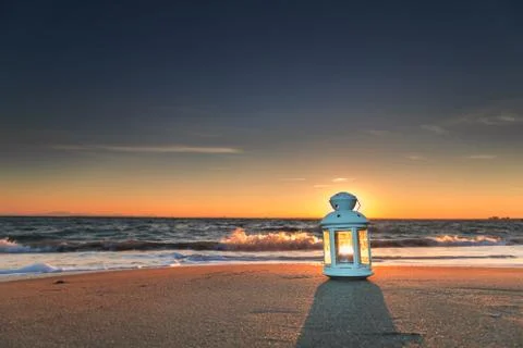 White lantern on the beach Stock Photos