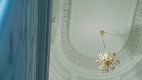 White large ceiling with a beautiful chandelier Video stock 120734016