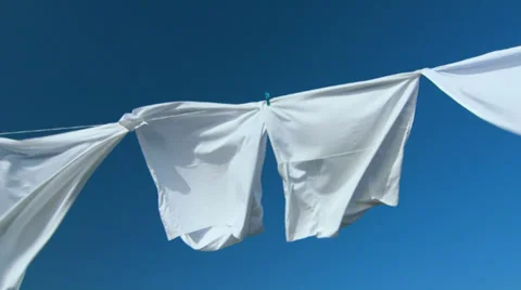 White laundry drying on clothesline Video stock 38309174