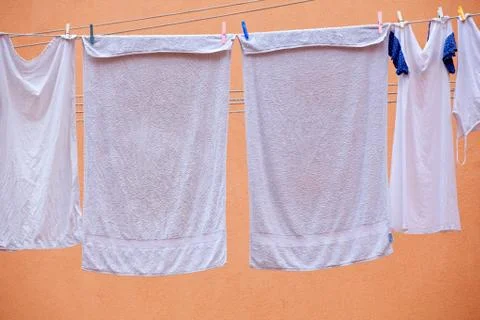 White laundry hanging to dry Stock Photos