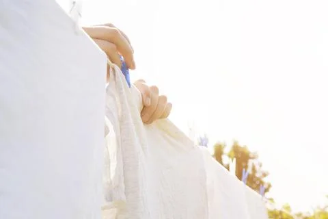 White laundry hanging string outdoors. High quality and resolution beautiful Stock Photos