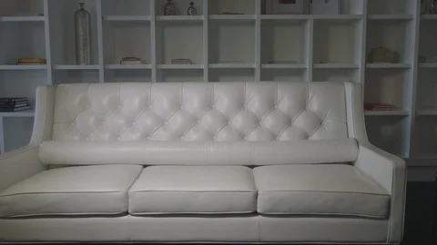 White Leather Couch In Studio Video stock 121287359