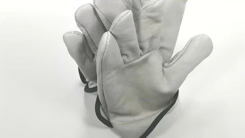 White leather work gloves Stock Footage 102619404