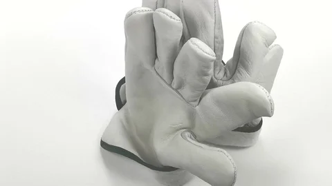 White leather work gloves Stock Footage 102619405