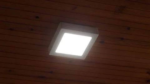 White LED light on wooden ceiling turning on and off. Indoor room square shaped  Stock Footage 276658849