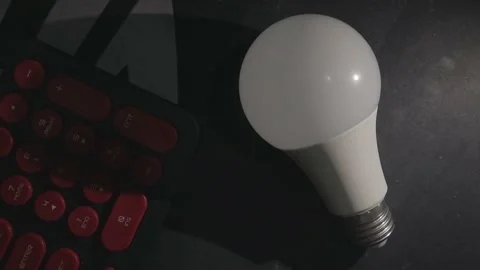 White LED Lightbulb with red keyboard button Stock Footage 204944325