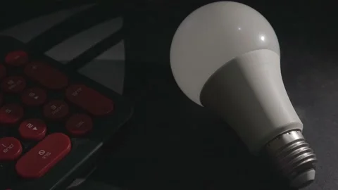 White LED Lightbulb with red keyboard button Stock Footage 204951242