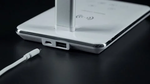 White LED table lamp on black background Stock Footage 152934450