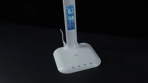 White LED table lamp on black background Stock Footage 152934471