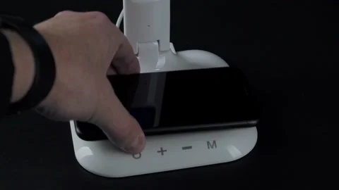 White LED table lamp on black background Stock Footage 152934487