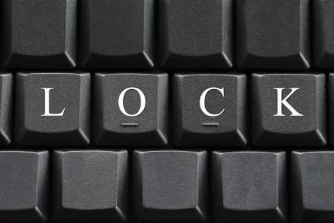 The white letter of Lock on computer keyboard background. Stock Photos