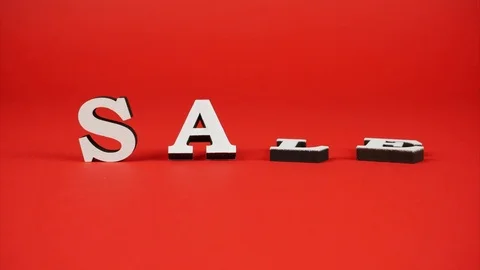 White letters rotating on the red background and forming the word Sale Video stock 119791125
