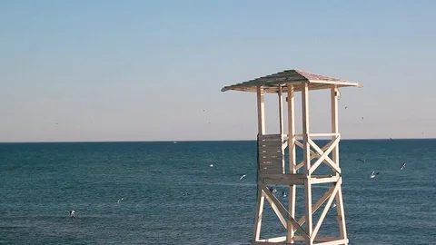 A white life saving tower in the Sea 動画素材 74396431