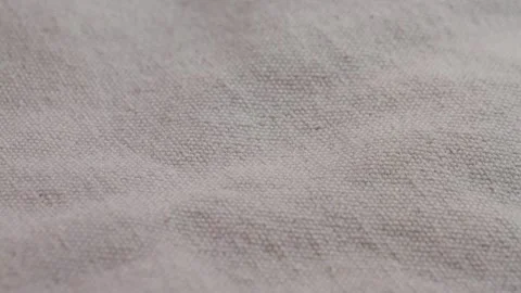 White light gray linen fabric, textile, material, close-up, macro. Textile Stock Footage 304059401