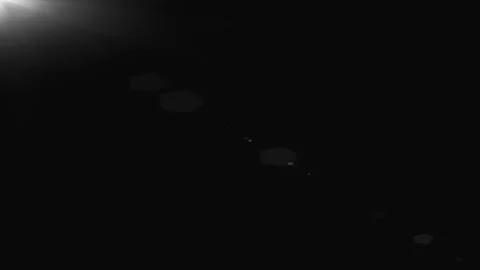 White light from the left moves away and closer. Vídeo Stock 315385836