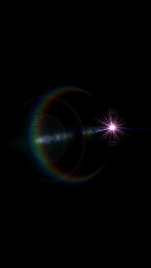 White light with pink rays radiates, forming rainbow halo against black backgrou Video stock 328567672