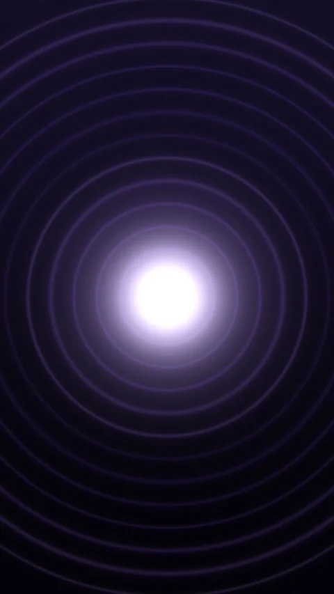 White light radiates concentric purple rings across a dark field Video stock 330561596