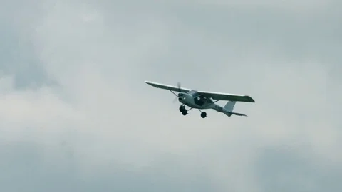White light single aircraft in the air Video stock 69934227