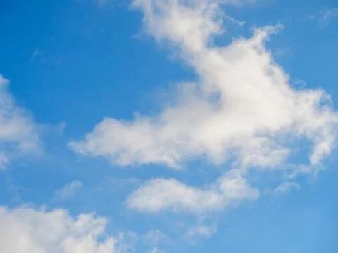 White light soft clouds against a blue sky Stock Photos
