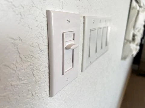 White Light Switch Panel with Dimmer Control Stock Photos
