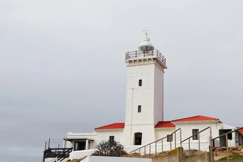 White Lighthouse Building At Cape St. Blaize With Overcast Sky Stock Photos