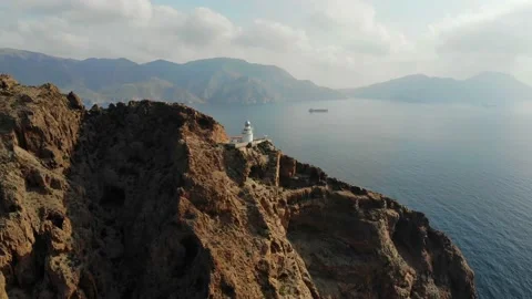 The white lighthouse of Cabo Tinoso taken from the air. Stock Footage