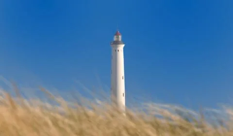 White lighthouse Stock Photos
