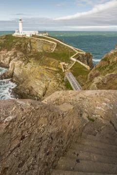 White lighthouse at South Stack. Stock Photos