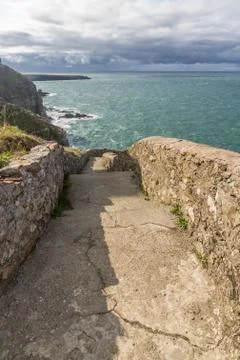 White lighthouse at South Stack. Stock Photos