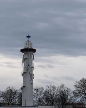 White Lighthouse Under Cloudy Sky Stock Photos