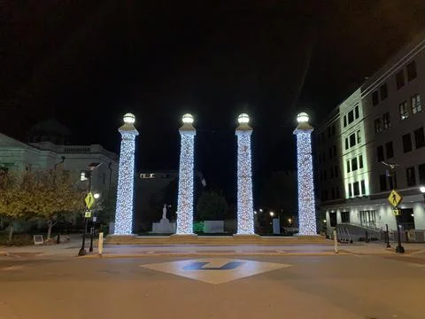 White lights of 4 doric columns at Boone County Court House Stock Photos