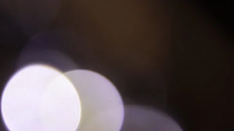 White lights in the background in the left corner move back and forth. Vidéo 309344979