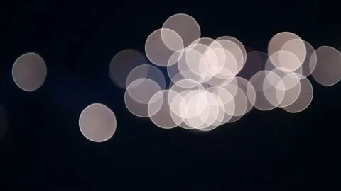 White lights bokeh blurred circles abstract background on black Stock Footage 163850318