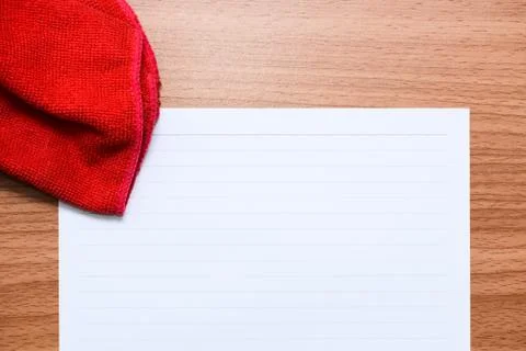 White line paper with red towel use for clean in kitchen or desktop , top vie Stock Photos