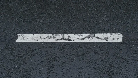 White line on the road. Alone. Close up. Stock Footage 92846835