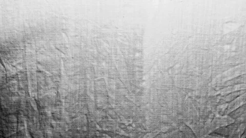 White linen fabric sways gently in cinematic slow motion creating serene organic Stock Footage 337550265