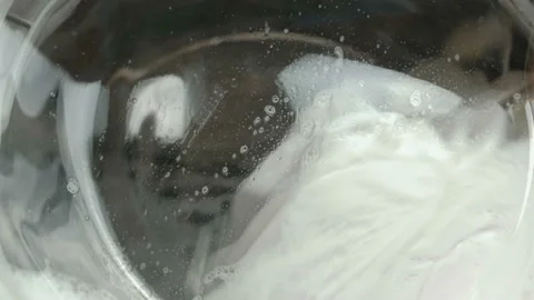 White linen is washed in the washing machine close-up. Stock Footage 88723221