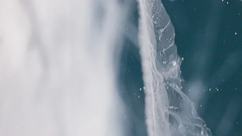 White lines cracks inside clear ice. Detailed view into deep glacial texture. Stock Footage 165149699