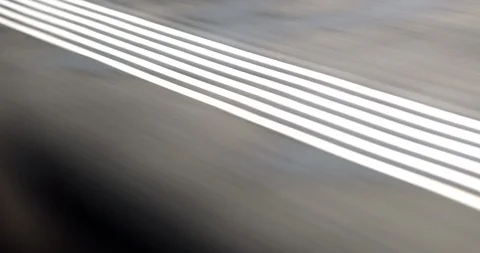 White lines seen from train window passing by in high-speed Stock Footage 118192615