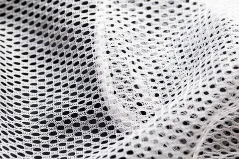 White lining in clothes in a hole, macro. Textured Foto stock