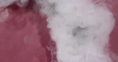 White Liquid with Black Splashes on a Pink Background Stock Footage 223255525