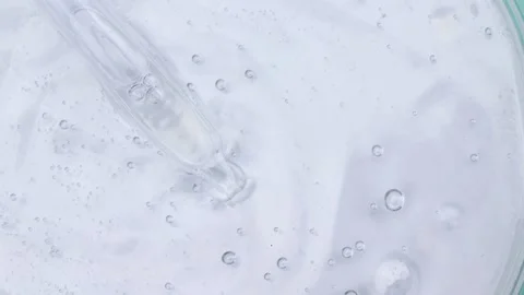 White liquid or raw material for skin care product Stock Footage 223673298