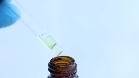 White liquid or raw material for skin care product Stock Footage 224839845