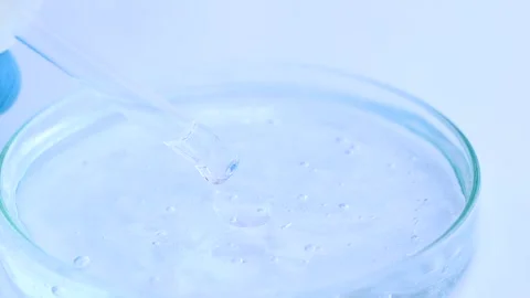 White liquid or raw material for skin care product Stock Footage 224839972