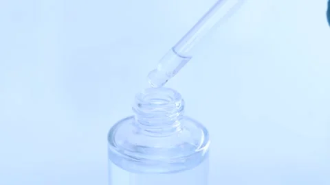 White liquid or raw material for skin care product Stock Footage 224839974