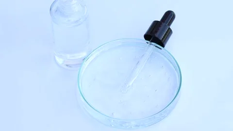 White liquid or raw material for skin care product Stock Footage 224840090