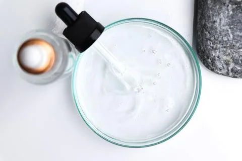 White liquid or raw material for skin care product 스톡 사진