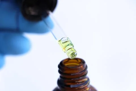 White liquid or raw material for skin care product Stock Photos